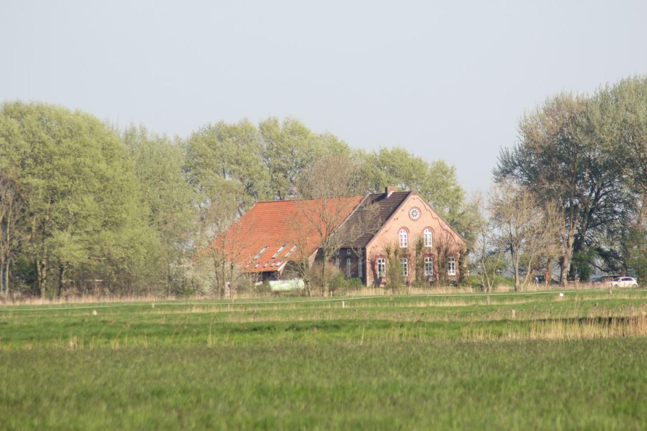 Krummhörn Ferienhof Spiegelhaus מראה חיצוני תמונה